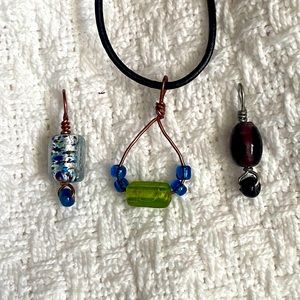 3 piece set. NWOT Handmade glass bead pendants